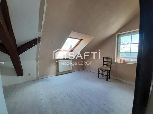2 chambres,  1 bureau et une place de parking