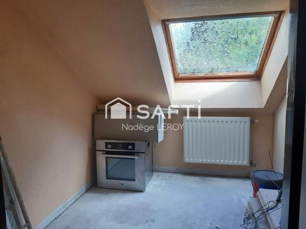 2 chambres,  1 bureau et une place de parking