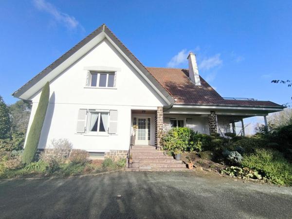 Propriété avec parc paysagé