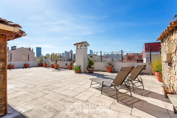 Appartement rénové en dernier étage avec une terrasse plein ciel de 122m2