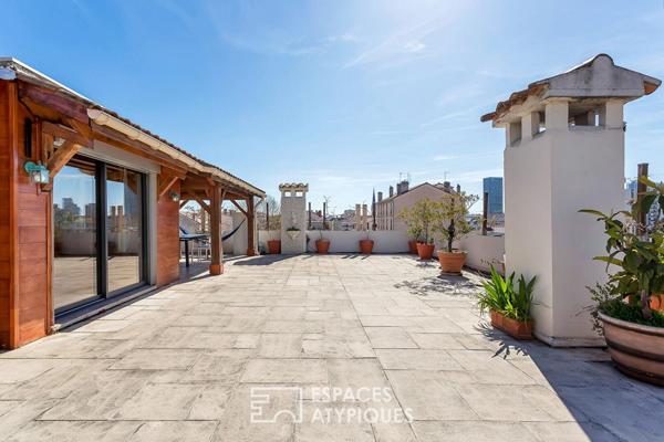 Appartement rénové en dernier étage avec une terrasse plein ciel de 122m2