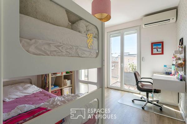 Appartement rénové en dernier étage avec une terrasse plein ciel de 122m2