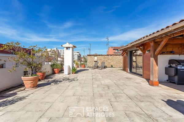 Appartement rénové en dernier étage avec une terrasse plein ciel de 122m2