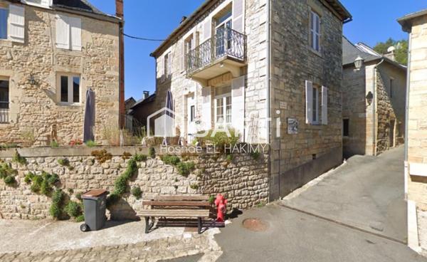 "Charmante maison en pierre de 90 m², située à Perpezac-le-Blanc."