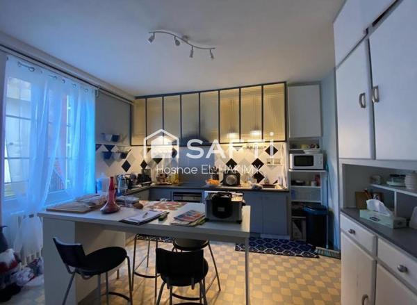 "Charmante maison en pierre de 90 m², située à Perpezac-le-Blanc."