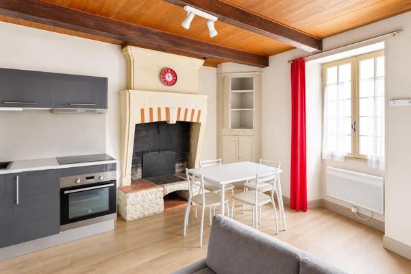 Idéal investissement locatif : Immeuble de 3 appartements dans une ville thermale à forte demande