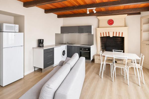Idéal investissement locatif : Immeuble de 3 appartements dans une ville thermale à forte demande