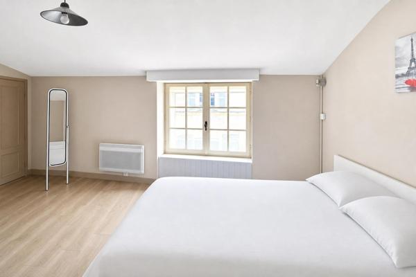 Idéal investissement locatif : Immeuble de 3 appartements dans une ville thermale à forte demande