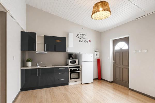 Idéal investissement locatif : Immeuble de 3 appartements dans une ville thermale à forte demande