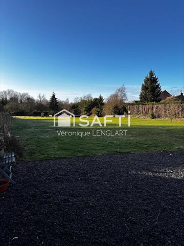 Vaste terrain en centre village