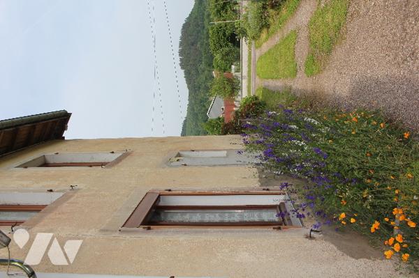 Maison mitoyenne d'un côté avec un garage sur 788m² de terrain, dont un jardin/potager de 300m²