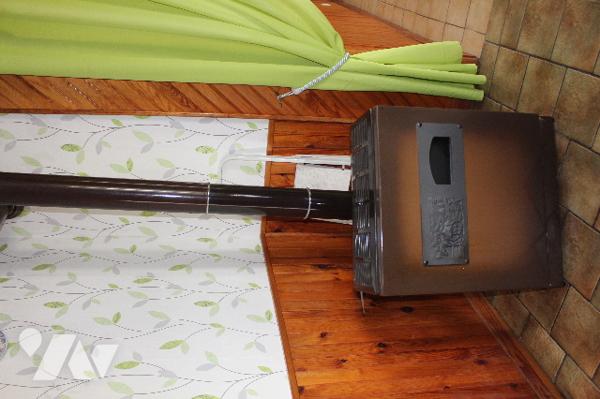 Maison mitoyenne d'un côté avec un garage sur 788m² de terrain, dont un jardin/potager de 300m²