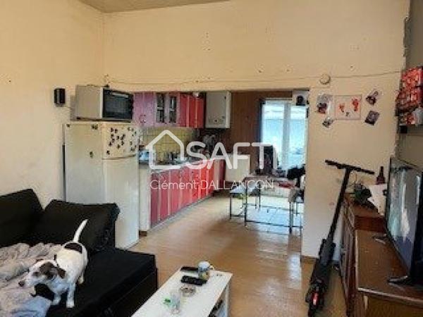 Immeuble de rapport ,commerce et logement locatif!