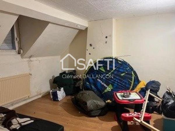 Immeuble de rapport ,commerce et logement locatif!