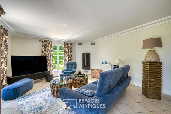 Élégante maison de plain-pied avec jardin paysager et double garage