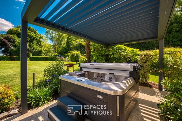Élégante maison de plain-pied avec jardin paysager et double garage