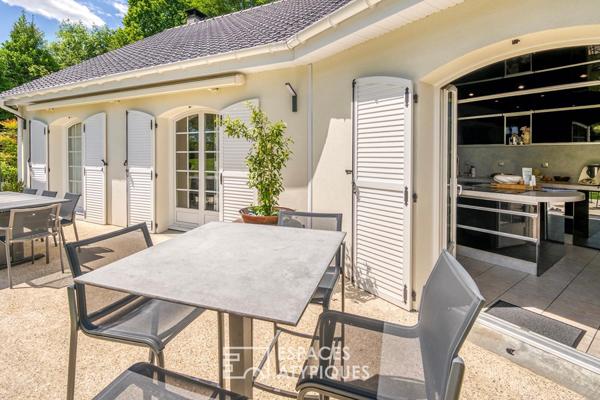 Élégante maison de plain-pied avec jardin paysager et double garage