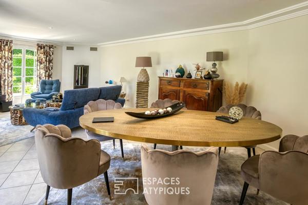 Élégante maison de plain-pied avec jardin paysager et double garage