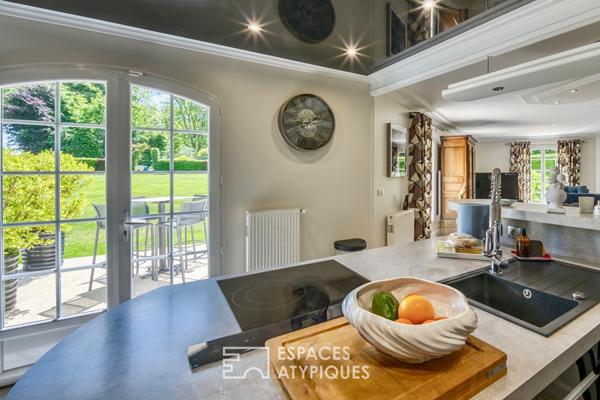 Élégante maison de plain-pied avec jardin paysager et double garage