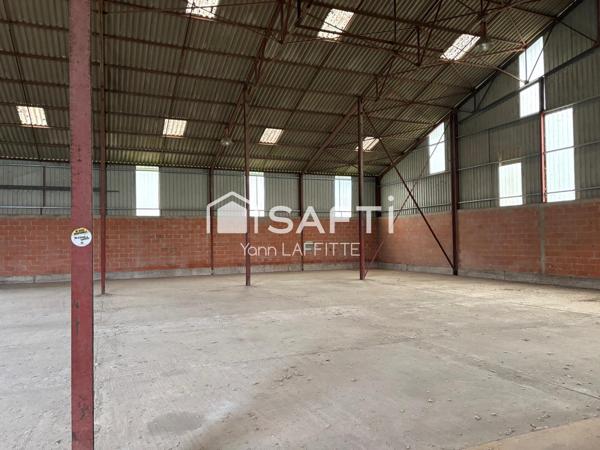 Ensemble immobilier ( hangar + terrain constructible )