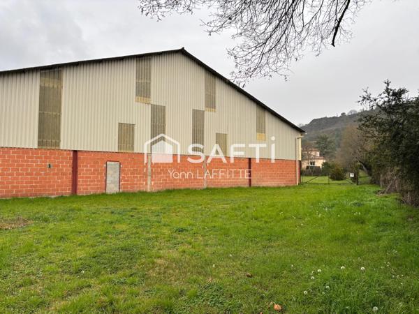 Ensemble immobilier ( hangar + terrain constructible )