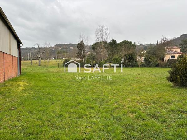 Ensemble immobilier ( hangar + terrain constructible )