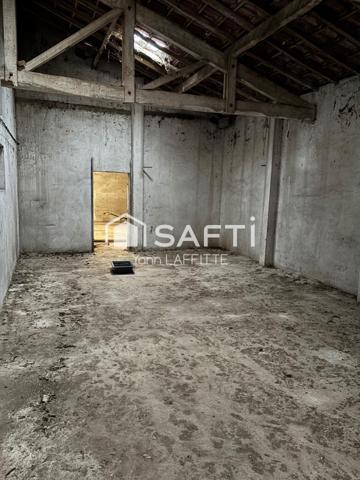 Ensemble immobilier ( hangar + terrain constructible )
