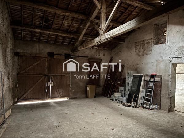 Ensemble immobilier ( hangar + terrain constructible )