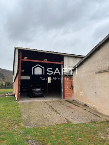 Ensemble immobilier ( hangar + terrain constructible )