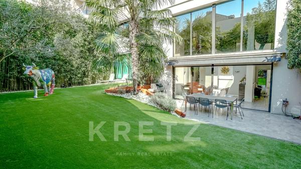 Maison d'architecte sur jardin arboré