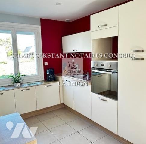 Maison avec grand terrain en zone constructible