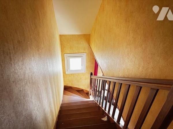 Maison avec grand terrain en zone constructible