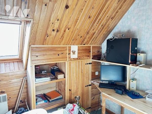 Maison avec grand terrain en zone constructible