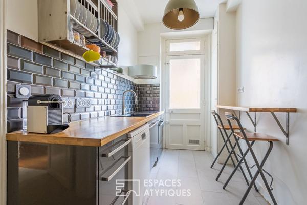 Appartement bourgeois avec véranda face au parc des Buttes Chaumont