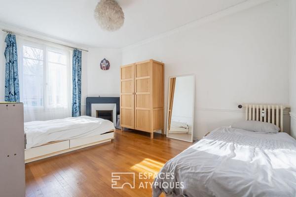 Appartement bourgeois avec véranda face au parc des Buttes Chaumont