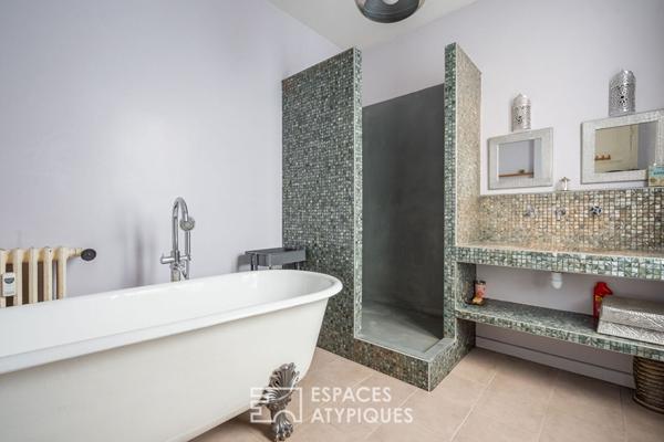 Appartement bourgeois avec véranda face au parc des Buttes Chaumont