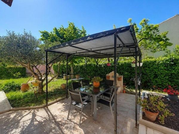 Maison divisée en 2 appartements