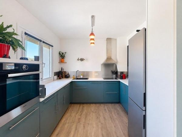 Maison divisée en 2 appartements