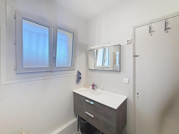 Maison divisée en 2 appartements