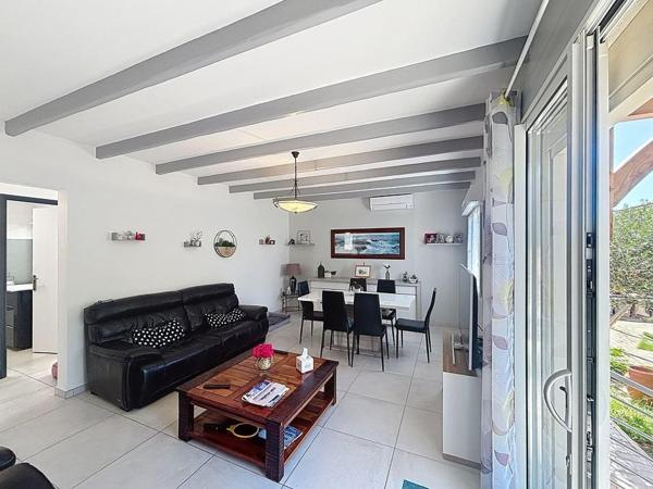 Maison divisée en 2 appartements