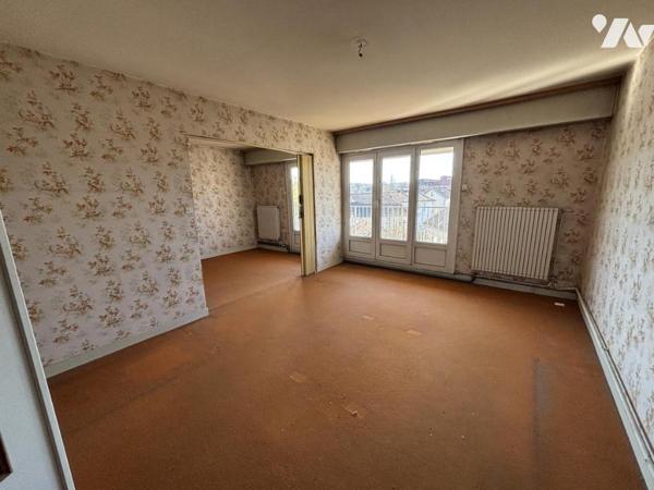 Appartement T3/4 (environ 84 m² habitables) avec garage et situé dans un secteur calme, à proximi