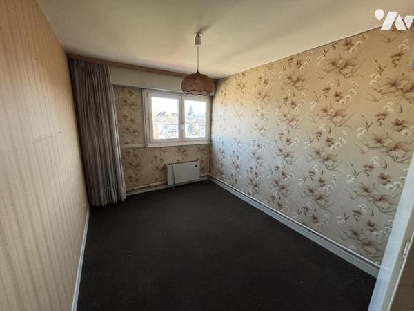 Appartement T3/4 (environ 84 m² habitables) avec garage et situé dans un secteur calme, à proximi