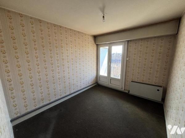 Appartement T3/4 (environ 84 m² habitables) avec garage et situé dans un secteur calme, à proximi