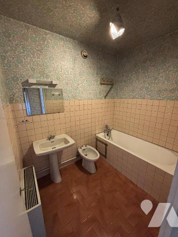 Appartement T3/4 (environ 84 m² habitables) avec garage et situé dans un secteur calme, à proximi