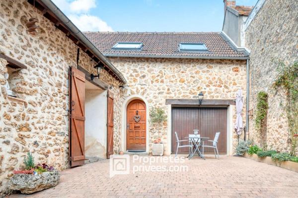 Bien de caractère et sa pièce de vie façon Loft