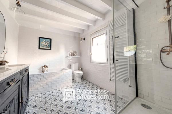 Bien de caractère et sa pièce de vie façon Loft
