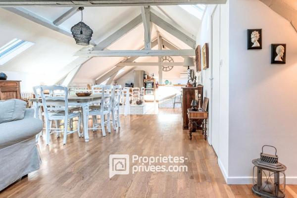 Bien de caractère et sa pièce de vie façon Loft