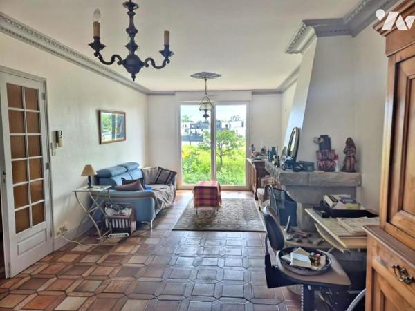 Jolie maison avec véranda et jardin aménagé