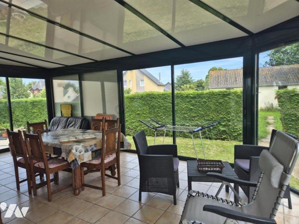 Jolie maison avec véranda et jardin aménagé
