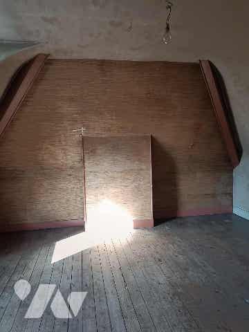 À Vendre – Ensemble Immobilier avec jardin, local commercial indépendant et stationnements.